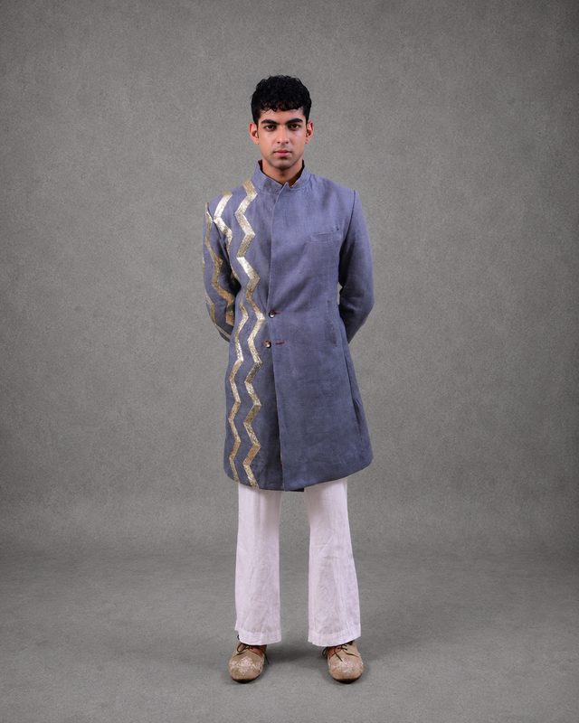 IHSAR White Wide-Leg Tailored Trousers in White – trousers with gold sequin embroidery