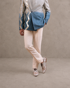 IHSAR Off-White Tailored Trousers in Off-White – trousers with gold sequin embroidery