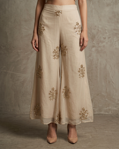 IHSAR Flared Off-White Pants in Beige – pants with gold sequin embroidery