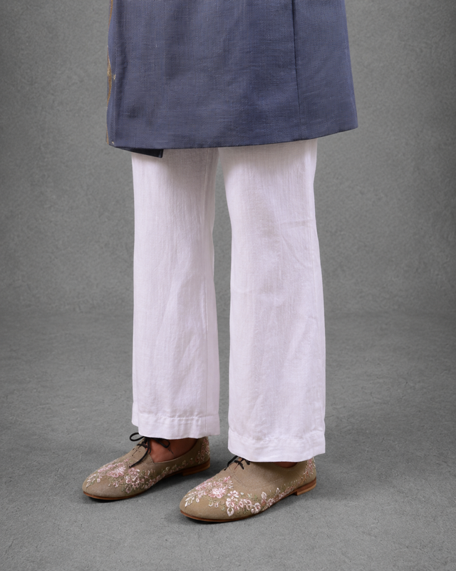 IHSAR White Wide Leg Tailored Trousers in White – side view