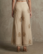 IHSAR Flared Off White Pants in Beige – back view