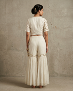 IHSAR White Angrakha Crop Top And Sharara Pant Set in Off-White – back view