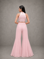 IHSAR Pastel Pink Flared Pants in Baby Pink – back view