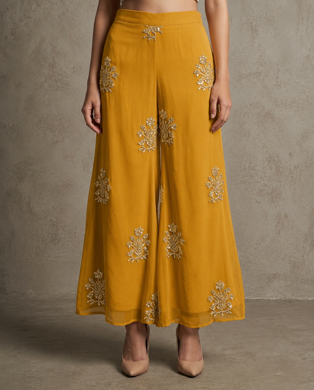 IHSAR Flared Off-White Pants in Mustard – pants with gold sequin embroidery